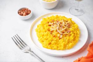 Risotto speck e zafferano, un primo piatto saporito