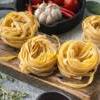 Nidi di tagliatelle al forno, una ricetta per le grandi occasioni